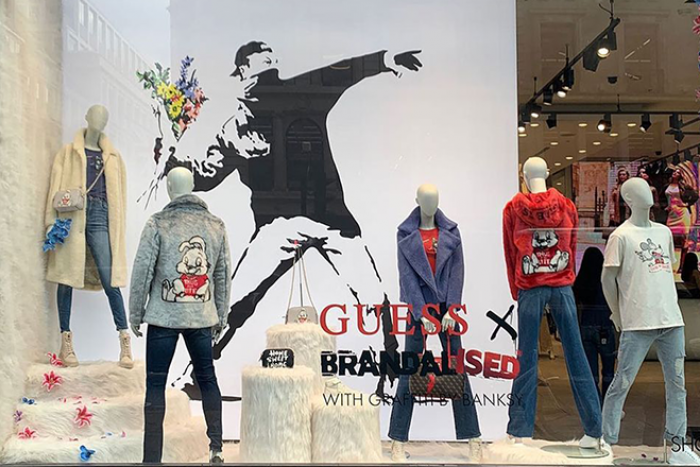Amigo por correspondencia nadie Obstinado Guess store forced to close in London after Banksy encourages shoplifters  to "help themselves" - News - Mixmag