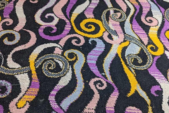 A nightclub in Halifax is selling off pieces of its notorious sticky carpet for charity