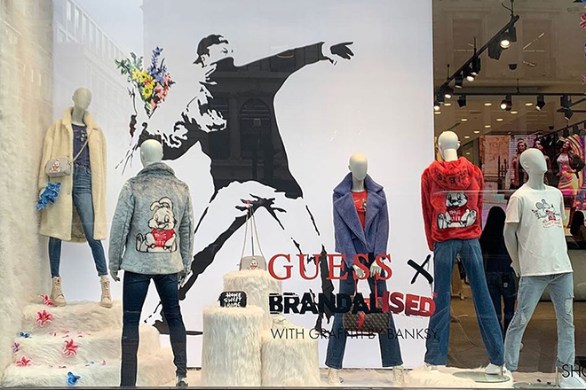 Guess store forced to close in London after Banksy encourages shoplifters to "help themselves"