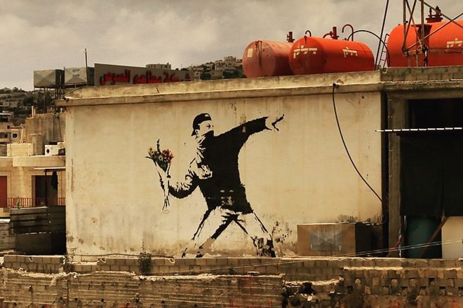 Banksy loses copyright to West Bank artwork after refusing to reveal identity
