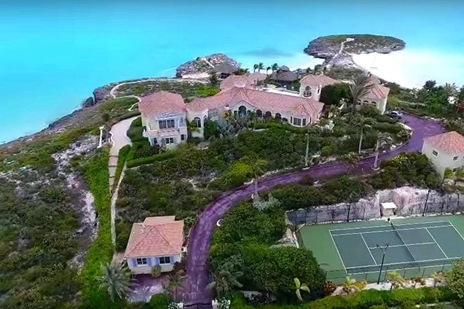 Prince's purple driveway mansion is up for auction