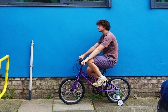 Ben on a bairn's bike fundraiser supporting North East grassroots music venue raises over £3000