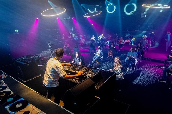 A seated, socially-distanced techno party has taken place in the Netherlands
