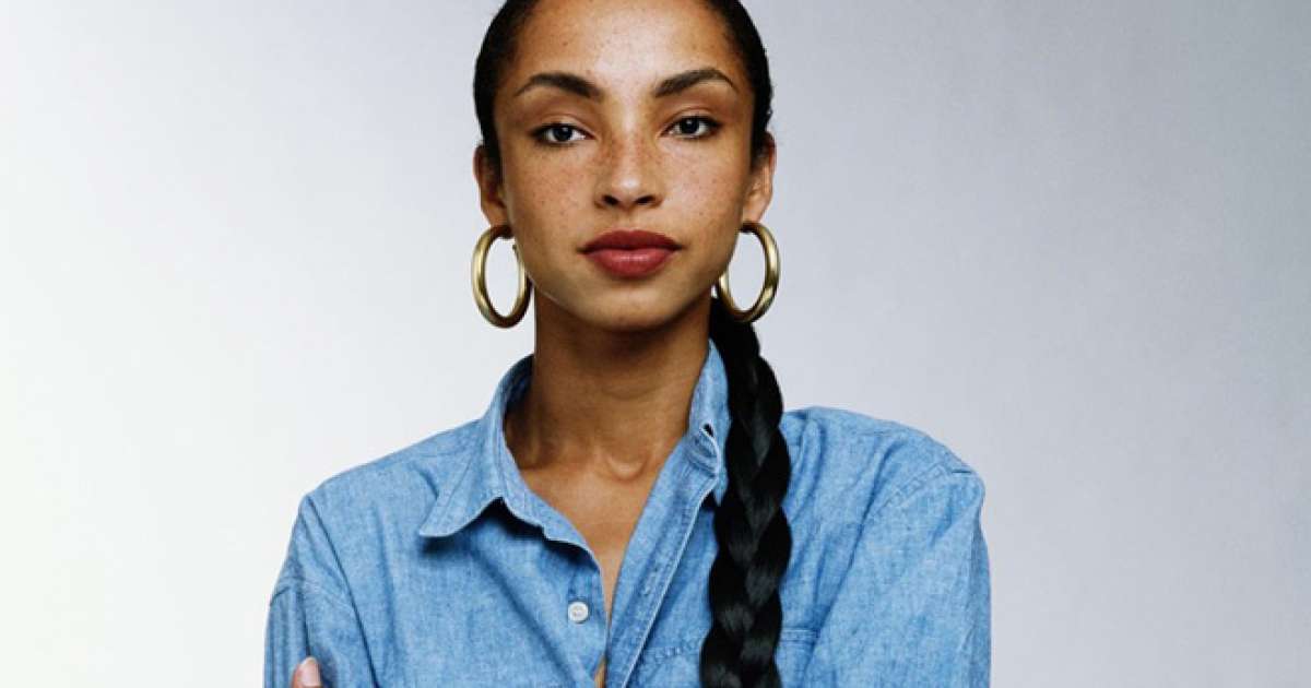 The 63-year old daughter of father (?) and mother(?) Sade in 2022 photo. Sade earned a  million dollar salary - leaving the net worth at  million in 2022